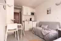 Kuchnia lub aneks kuchenny w obiekcie Cosy Appartement - 4 personnes - Disneyland & Paris