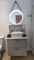 Een badkamer bij R&eacute;sidence du Palais