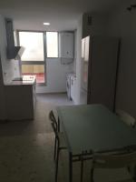 Kuchyň nebo kuchyňský kout v ubytování Apartamento Cream MRZ Rentals