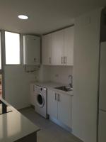 Kuchyň nebo kuchyňský kout v ubytování Apartamento Cream MRZ Rentals