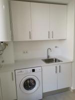 Kuchyň nebo kuchyňský kout v ubytování Apartamento Cream MRZ Rentals