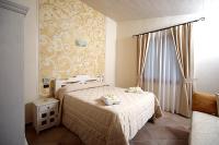 Postel nebo postele na pokoji v ubytování Agriturismo Il Barone
