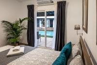 Łóżko lub łóżka w pokoju w obiekcie Villa Dora Bella Lanzarote