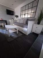 Posedenie v ubytovaní LUCY Apartments with heated pool & free private parking