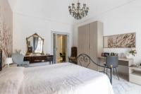 A bed or beds in a room at La casa di nonna Lilla