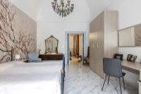 A bed or beds in a room at La casa di nonna Lilla