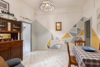 A bed or beds in a room at La casa di nonna Lilla