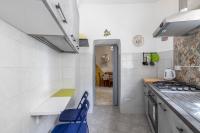 A kitchen or kitchenette at La casa di nonna Lilla