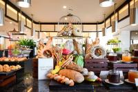 a display of food on a counter in a store at Emerald Ho Tram Resort in Ho Tram