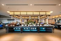 a store with a display of cups and dishes at Emerald Ho Tram Resort in Ho Tram