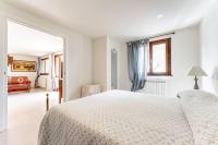 A bed or beds in a room at Villa Villacolle