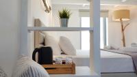 Hermoso Luxury Suitesにあるベッド