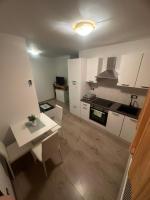 Kuchyňa alebo kuchynka v ubytovaní Apartmani G&E