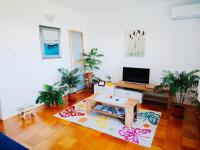 Televízia a/alebo spoločenská miestnosť v ubytovaní FoREST Heritage Apartment