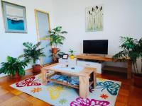 Televízia a/alebo spoločenská miestnosť v ubytovaní FoREST Heritage Apartment