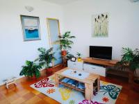 Televízia a/alebo spoločenská miestnosť v ubytovaní FoREST Heritage Apartment