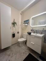 Een badkamer bij Grand studio localisation id&eacute;ale