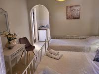 Postel nebo postele na pokoji v ubytování Margarita rooms