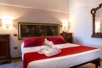Posteľ alebo postele v izbe v ubytovaní S. Martin Hotel