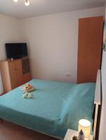 Postel nebo postele na pokoji v ubytování Apartment Milotić