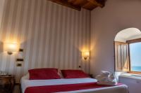 Posteľ alebo postele v izbe v ubytovaní S. Martin Hotel