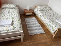 Posteľ alebo postele v izbe v ubytovaní Apartament Centrum
