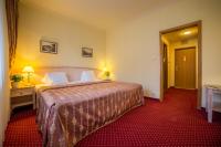 Postel nebo postele na pokoji v ubytování Interhotel Central