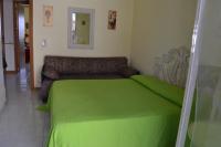 Posteľ alebo postele v izbe v ubytovaní Holiday House Naxos