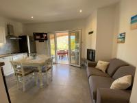 Televízia a/alebo spoločenská miestnosť v ubytovaní Casa vacanze Sardegna B