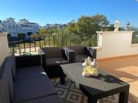 A balcony or terrace at A beautiful pool view apartment - AO1822LT