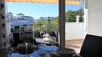A balcony or terrace at A beautiful pool view apartment - AO1822LT