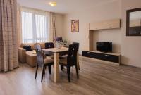 TV a/nebo společenská místnost v ubytování Sorento Sole Mare Apartments