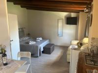 A television and/or entertainment centre at "The Cottage"with sea view, parking & wifi