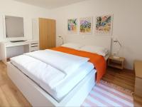 Posteľ alebo postele v izbe v ubytovaní Apartments Kump