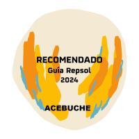 a poster for a redefined club represet in a white circle at Hotel Puerta de la Luna in Baeza