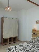 Una cama o camas en una habitaci&oacute;n de Gite des Limagnes