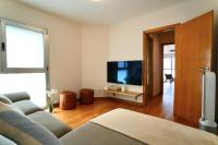 TV a/nebo společenská místnost v ubytování Sunny Home Canteras Beach
