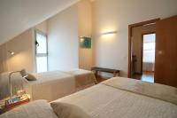 Postel nebo postele na pokoji v ubytování Sunny Home Canteras Beach