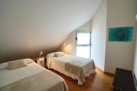 Postel nebo postele na pokoji v ubytování Sunny Home Canteras Beach