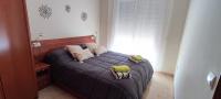 Posteľ alebo postele v izbe v ubytovaní Apartamento residencial en Les Cases D'Alcanar