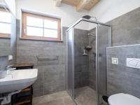 a bathroom with a shower and a sink at Haus Lilyan in Donnersbachwald