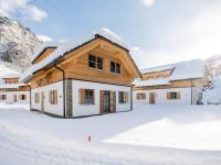 a house in the snow with snow covered ground at Haus Lilyan in Donnersbachwald