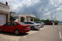 a group of cars parked in a parking lot at Apartments by the sea Jezera, Murter - 5123 in Jezera