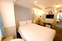 Toyoko Inn Changwonにあるベッド