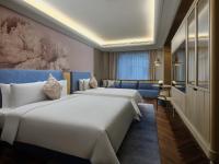 Blossom House Shanghai On The Bundにあるベッド