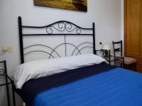 Postel nebo postele na pokoji v ubytování Bungalows Peñismar II 3000