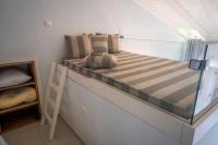 A bed or beds in a room at Ktima Faki, Olympus Mountain Accommodation & Retreat