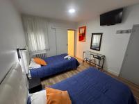 Posteľ alebo postele v izbe v ubytovaní Hostal ARS