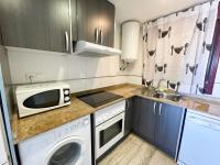 Kuchyňa alebo kuchynka v ubytovaní Apartamentos Mirador del Castillo 3000