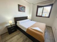 Posteľ alebo postele v izbe v ubytovaní Apartamentos Mirador del Castillo 3000